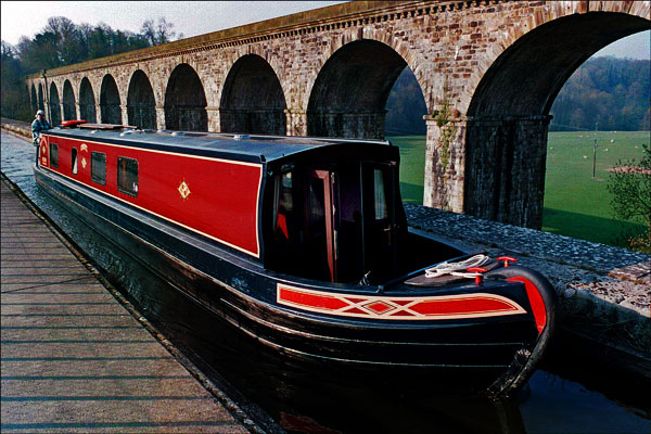Narrowboat. Chirk Aqueduct, with the Chirk (railway) Viaduct as a backdrop